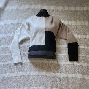 Olivaceous Tri-Tone Turtleneck Sweater in Cream, Tan, and Black